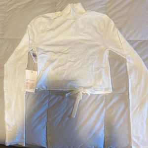 White open back turtle neck